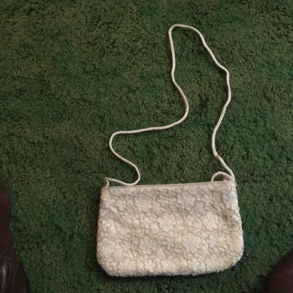 White beaded clutch with strap